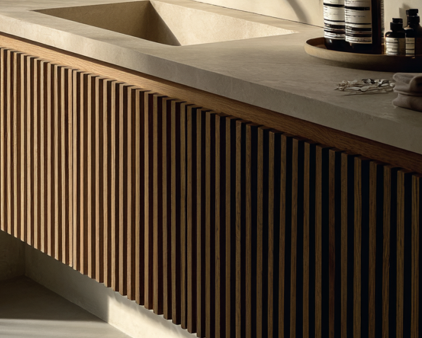 custom fluted floating vanity handcrafted in walnut and white oak with satin finish