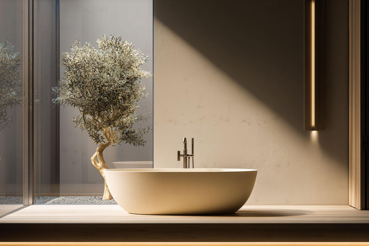 Sculptural freestanding bathtub beside floor-to-ceiling glazing in a serene minimalist spa bathroom