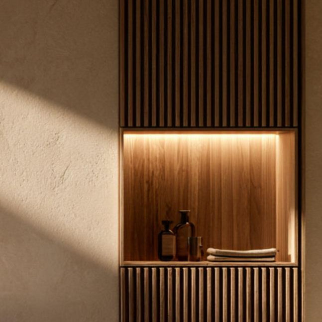 Natural stepping stones and a tranquil water garden surrounded by minimalist spa architecture